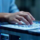 Hands using modern veterinary diagnostic device